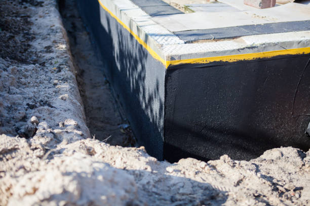 Professional Exterior Waterproofing technician working in Asbury Park, NJ